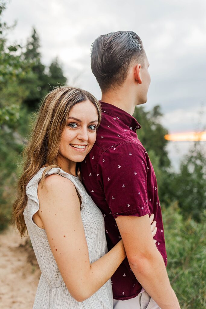 Couple celebrating their engagement at Sleeping Bear Dunes