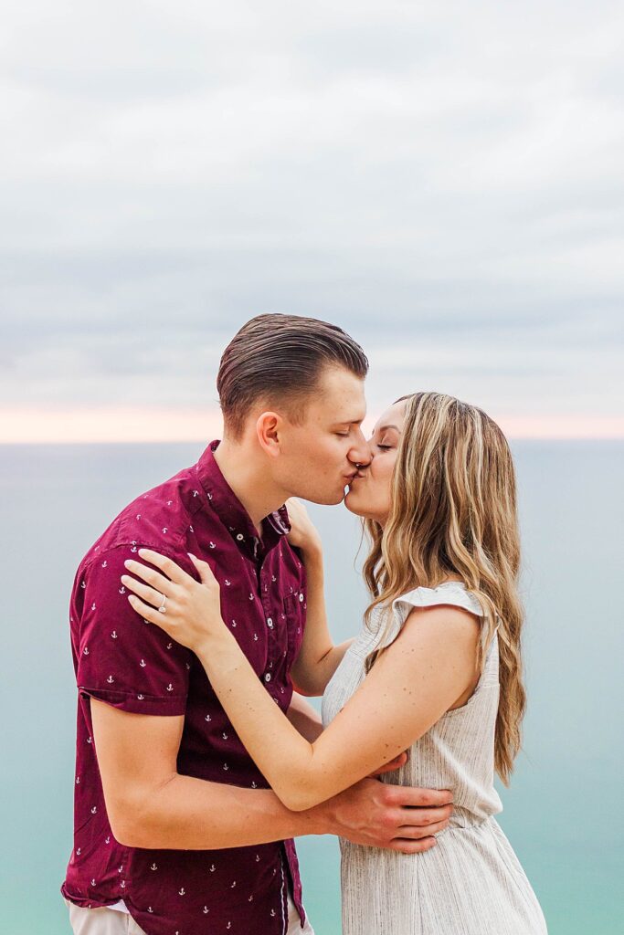 Couple celebrating their engagement at Sleeping Bear Dunes