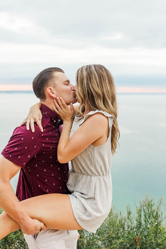 Man proposing at Pyramid Point overlook in Sleeping Bear Dunes