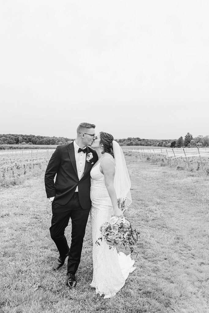 Bride and groom sharing a quiet moment together on their Northern Michigan wedding day