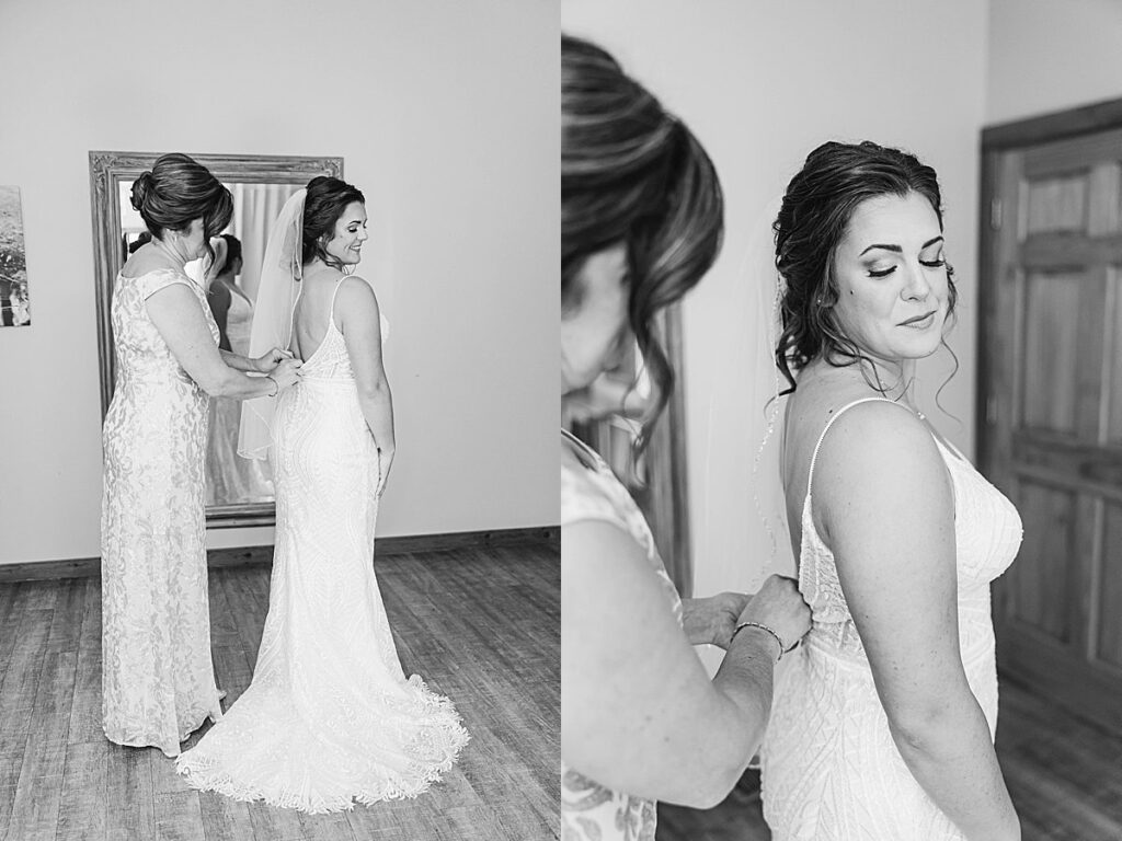 Bride getting ready in soft window light before her Traverse City wedding