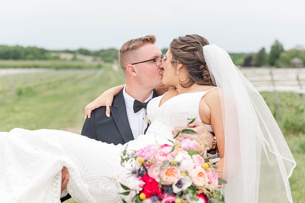 Bride and groom sharing a quiet moment during wedding portraits