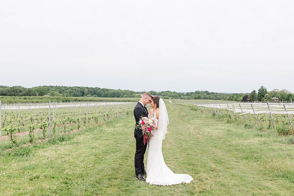 Bride and groom soaking in the moment on their wedding day in Traverse City