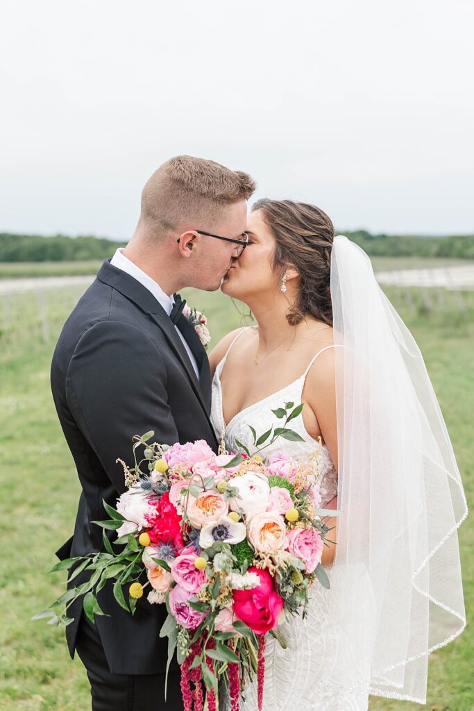 Bride and groom soaking in the moment on their wedding day in Traverse City