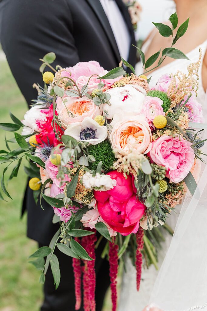 Bridal portrait featuring colorful florals on a Northern Michigan wedding day
