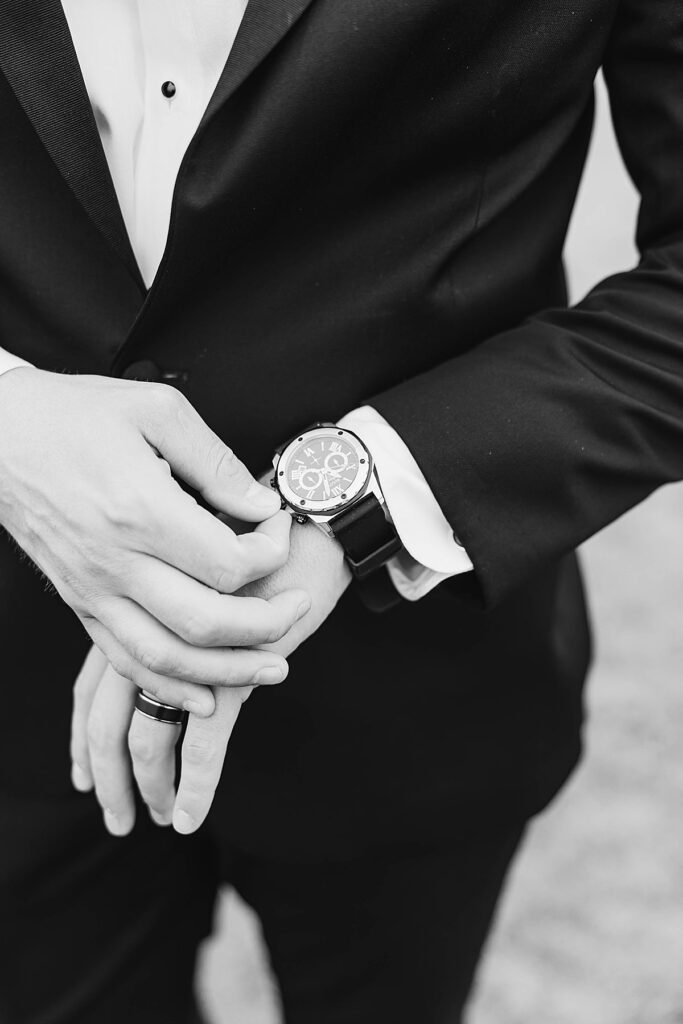 Groom portrait featuring classic style during a Northern Michigan wedding