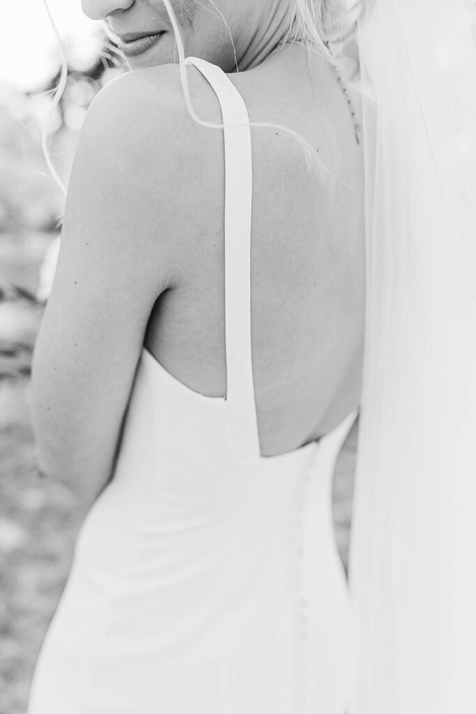 Timeless wedding dress detail photographed on the wedding morning
