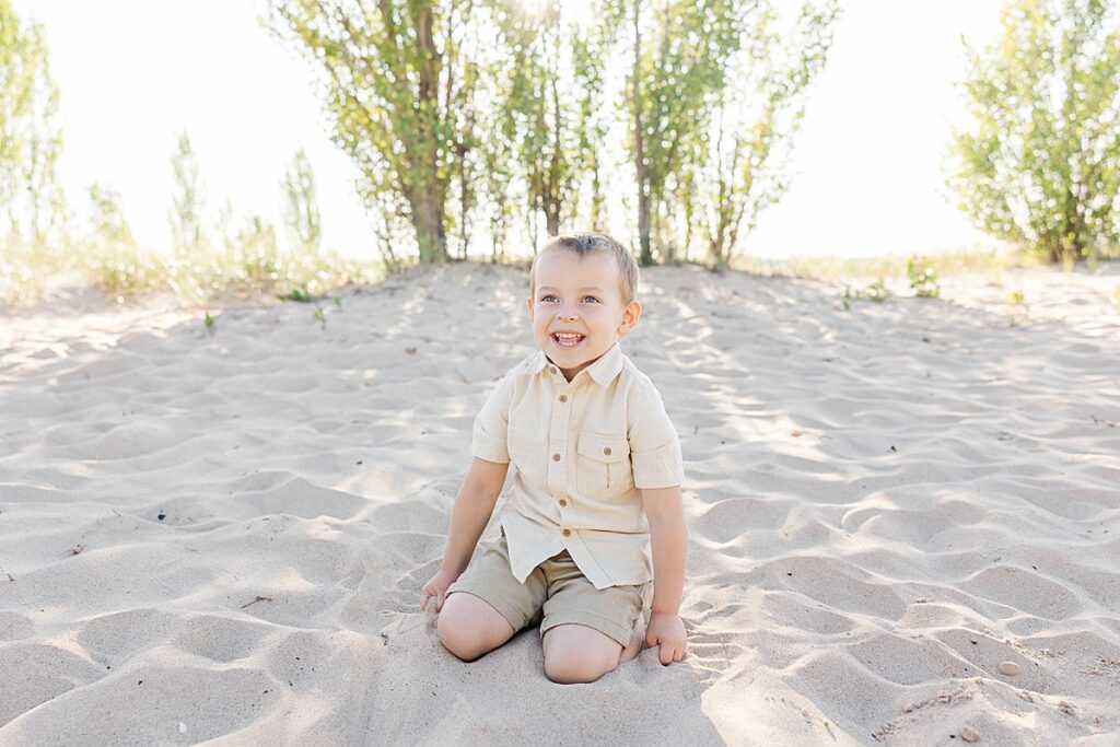 Toddler laughing during a Northern Michigan family photoshoot