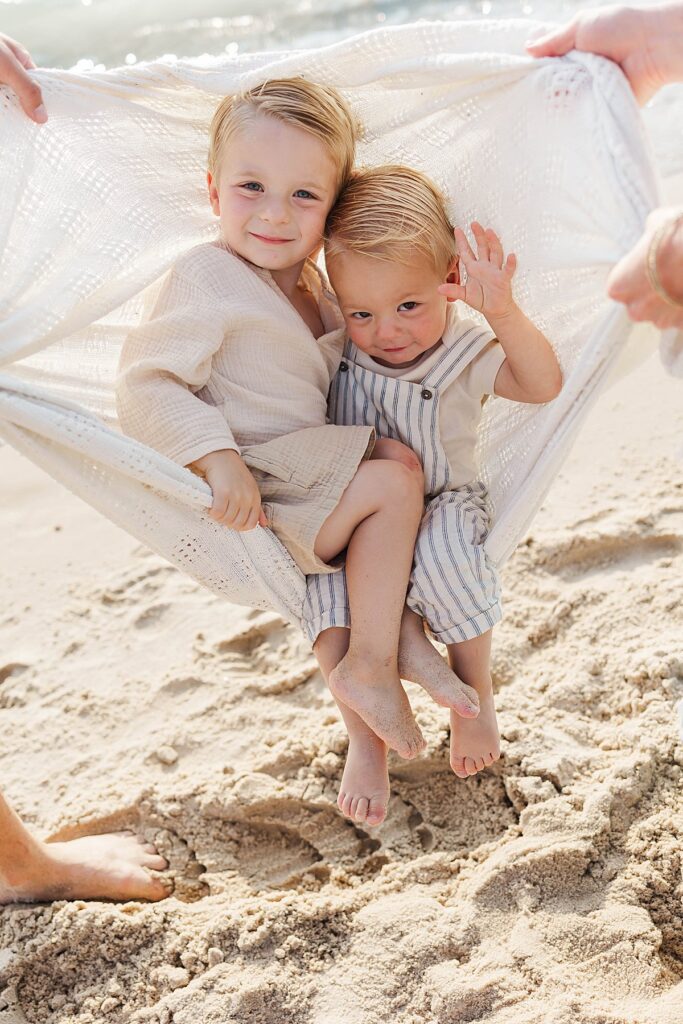 Relaxed family portraits at Empire Beach at sunset
