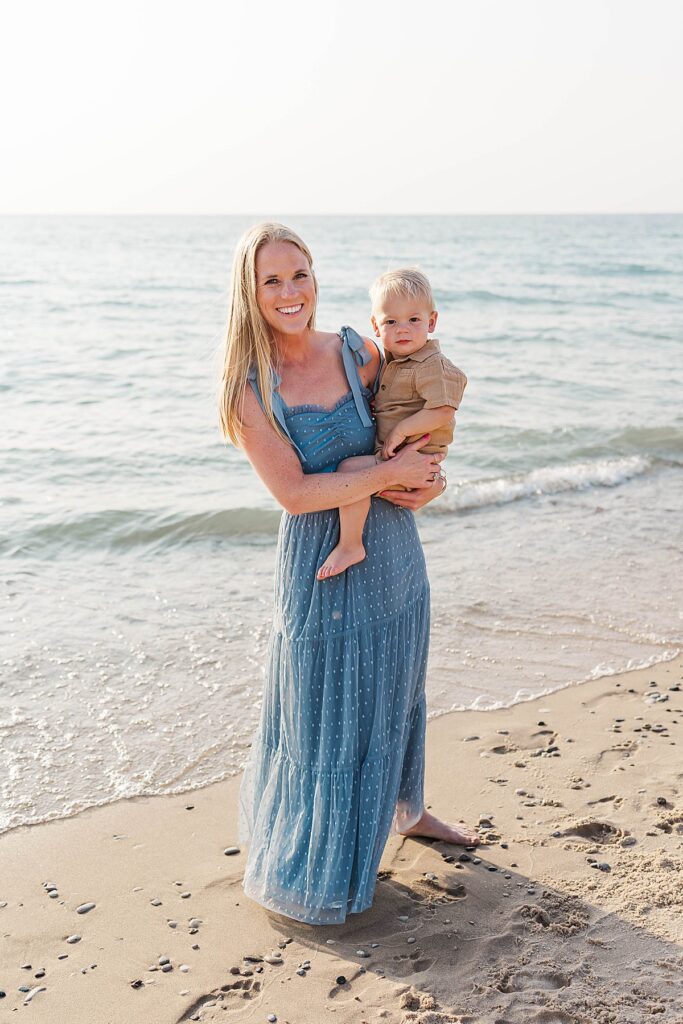 Mother and child sharing a quiet moment at Empire Beach