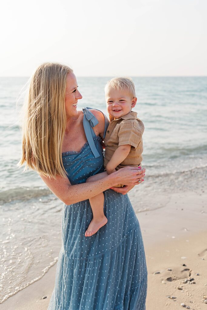 Mother and child sharing a quiet moment at Empire Beach