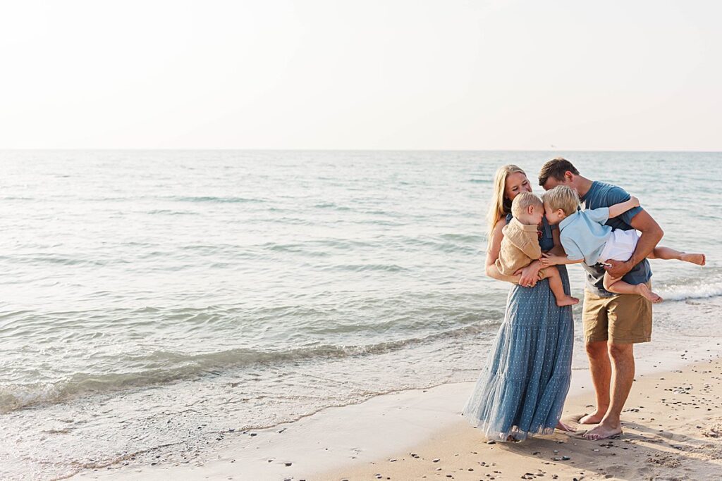Relaxed family portraits at Empire Beach at sunset