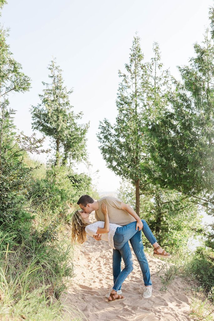 Wide landscape engagement photo at Empire Bluff Trail with Lake Michigan views