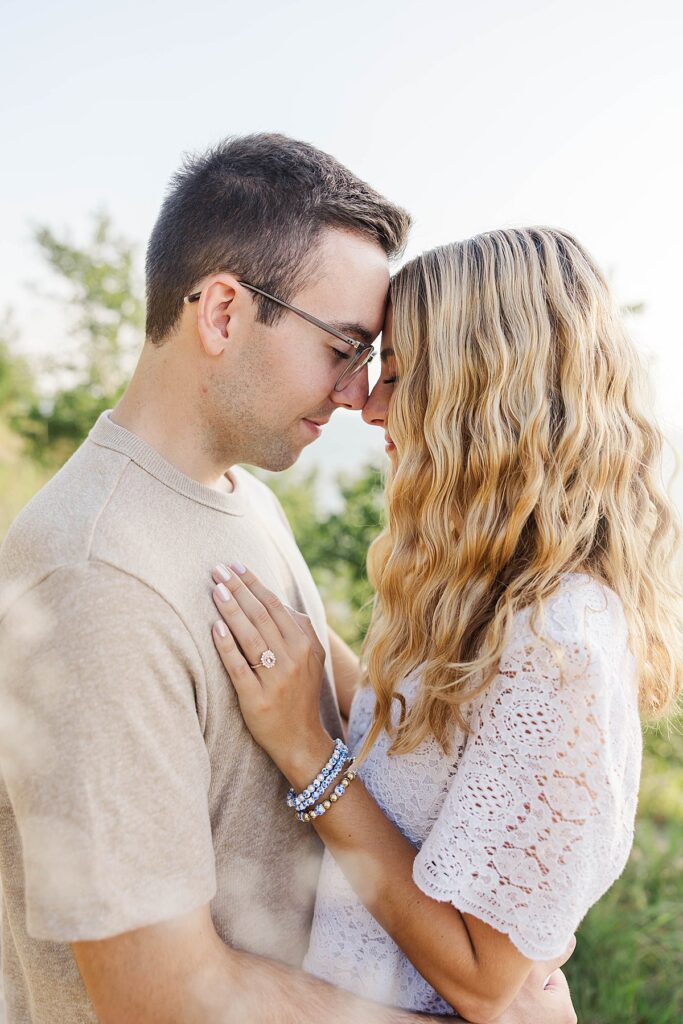 Intimate Empire Bluff engagement photo of couple sharing a quiet moment