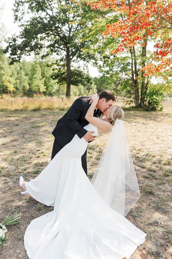 Documentary-style couple portraits from a Mill Pond Event Center fall wedding