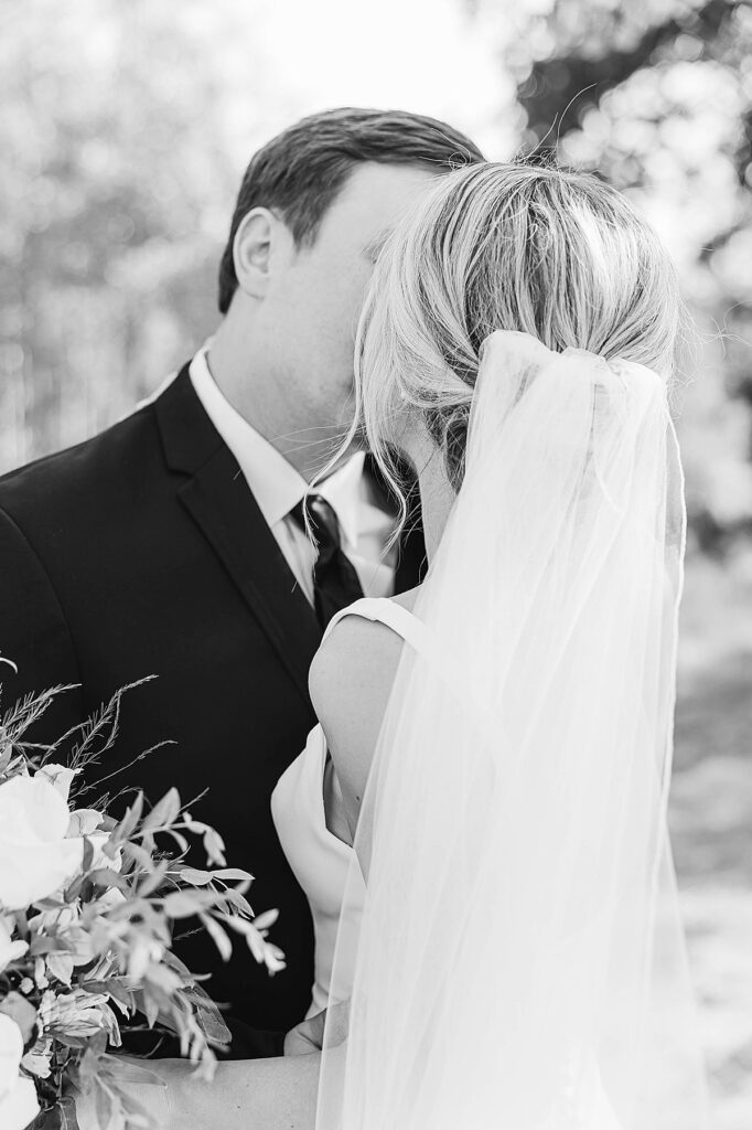 Romantic wedding portraits of bride and groom in Northern Michigan