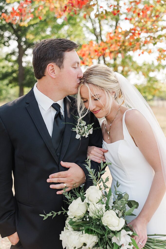 Couple portraits during a Northern Michigan fall wedding at Mill Pond Event Center