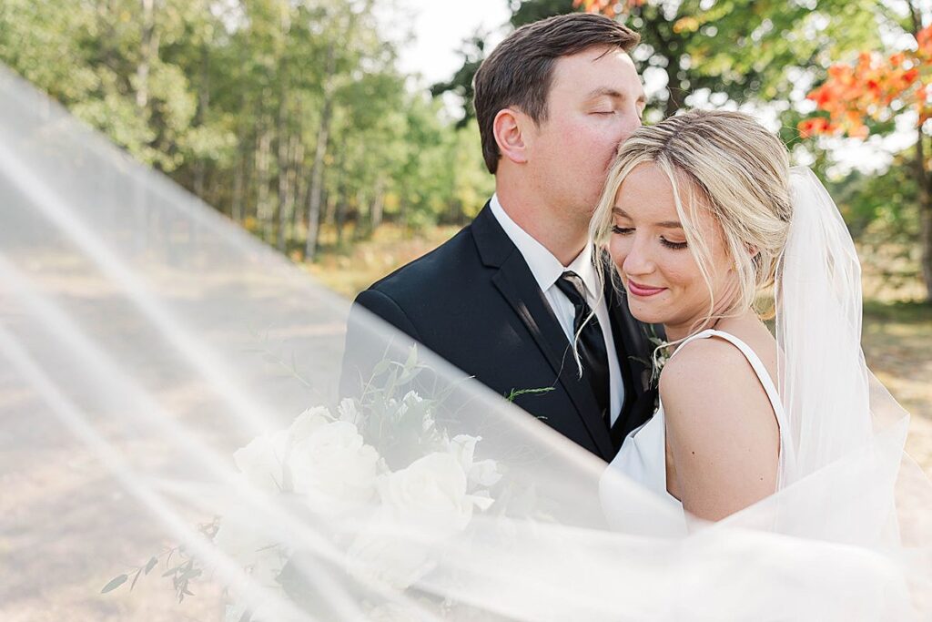 Timeless bride and groom portrait from a Northern Michigan fall wedding