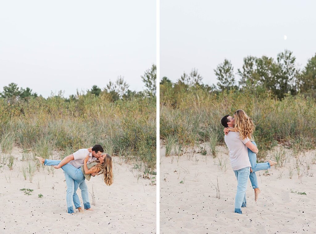 Candid Northern Michigan beach engagement photos capturing a joyful couple by the water