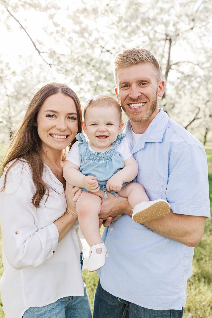 Family photos during peak cherry blossom season in Northern Michigan