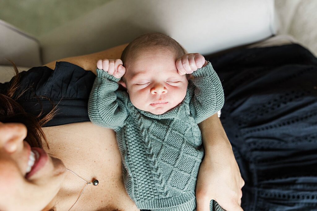 Emotional mother and newborn moment captured in Northern Michigan