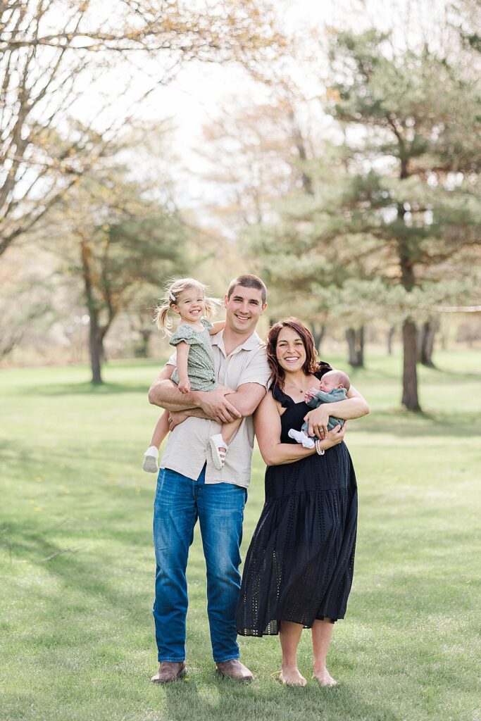 Newborn family photos captured outside in Northern Michigan