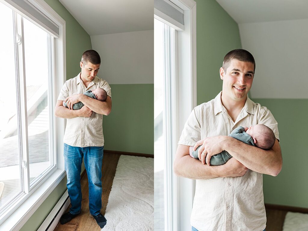 Father holding his newborn during a Northern Michigan newborn session