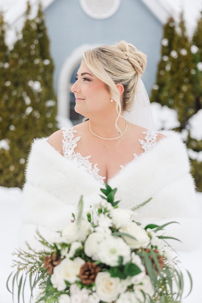 Bride sharing a quiet moment with her mom before a winter ceremony
