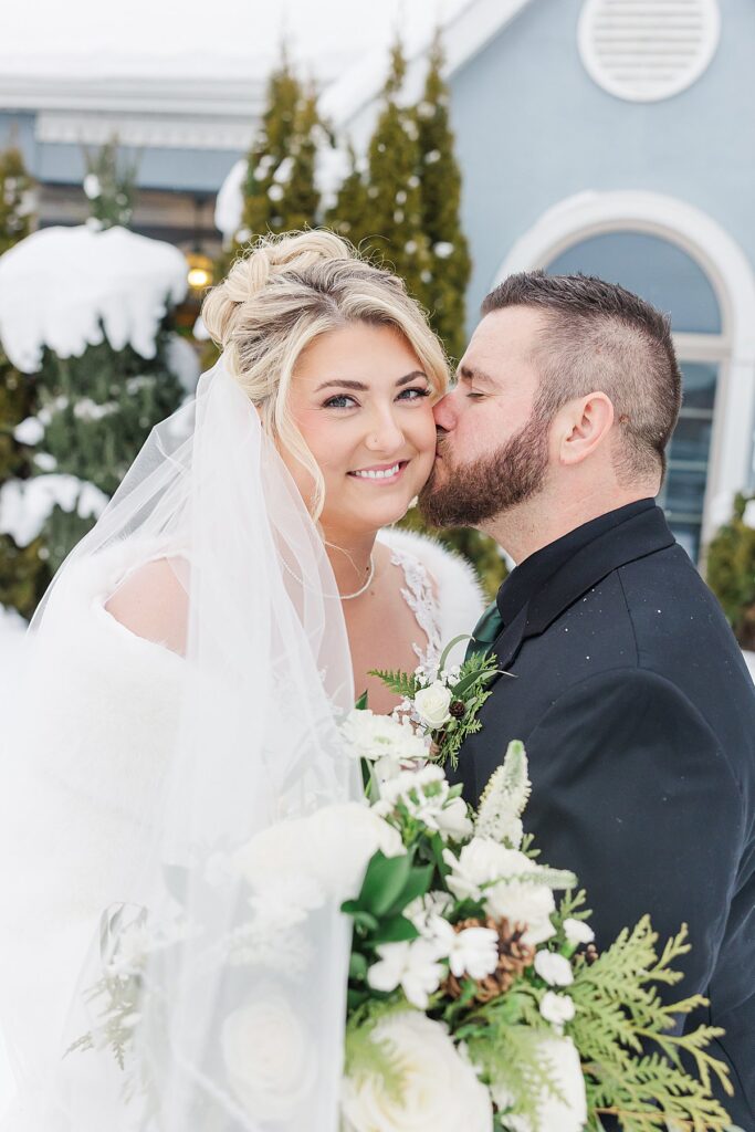 Romantic winter wedding portraits near Traverse City, Michigan