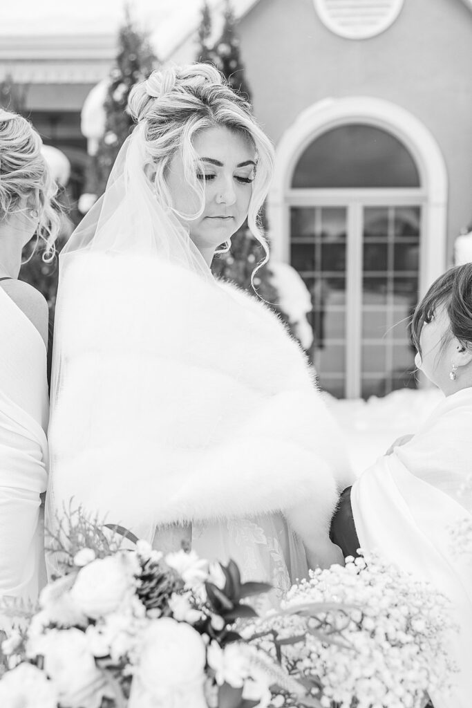 Winter wedding celebration surrounded by loved ones