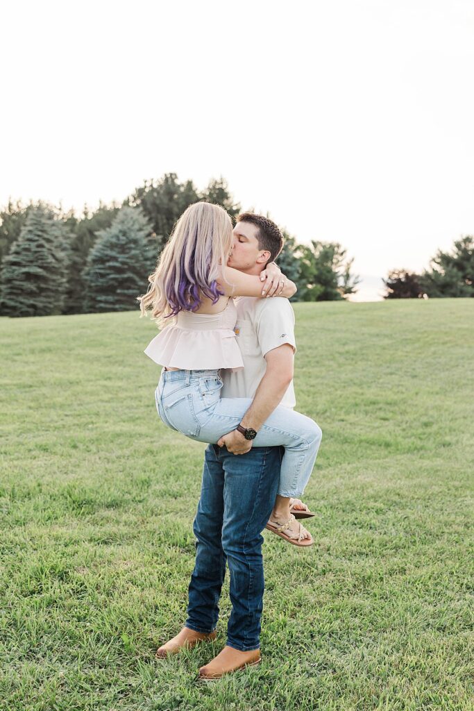 Natural engagement photos captured on a Michigan family farm