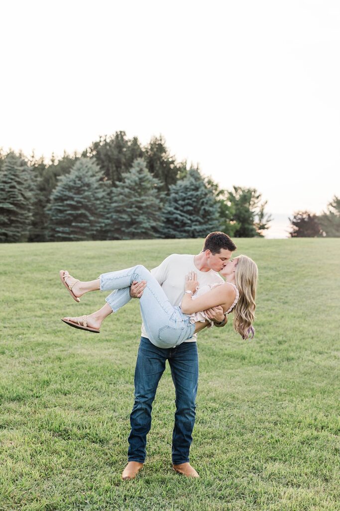 Joyful, candid moments during a Michigan engagement session outdoors
