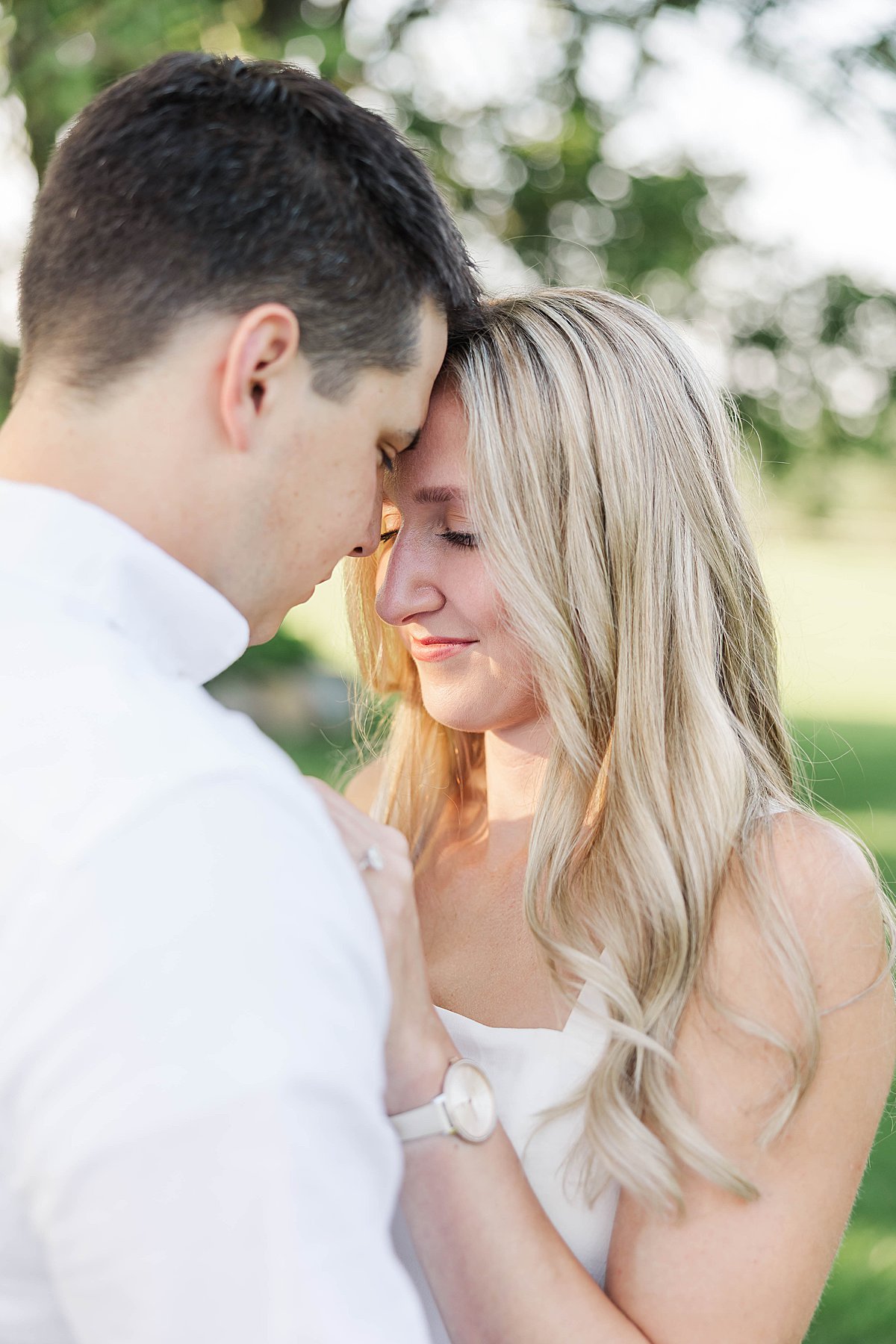 Elevated engagement portraits with timeless outfits during a Michigan session