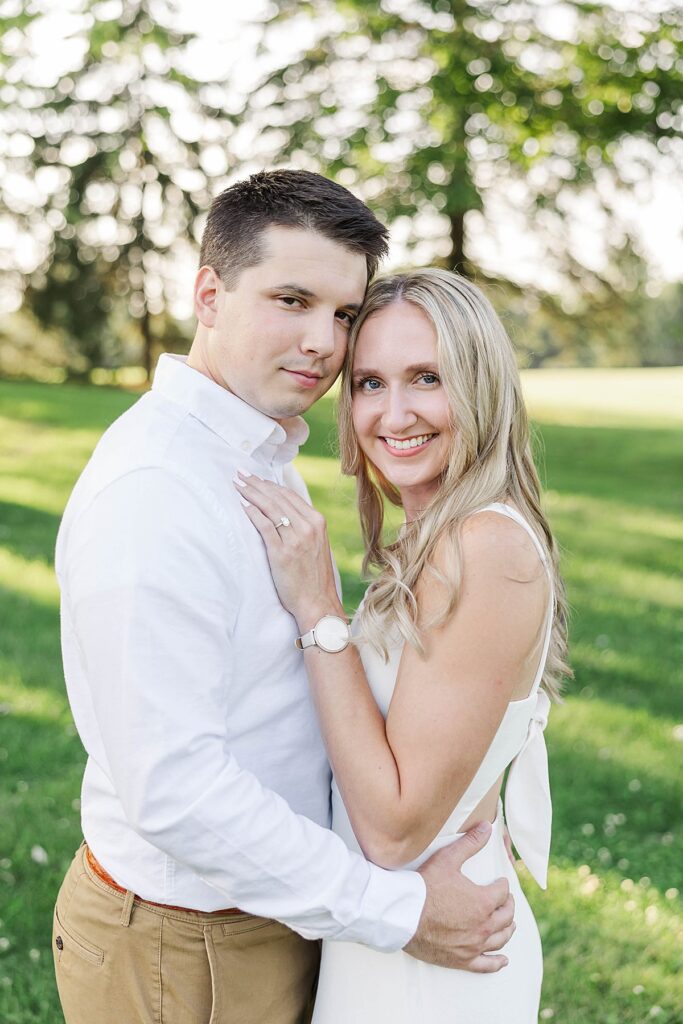 Michigan engagement session photographed on a private family property surrounded by trees