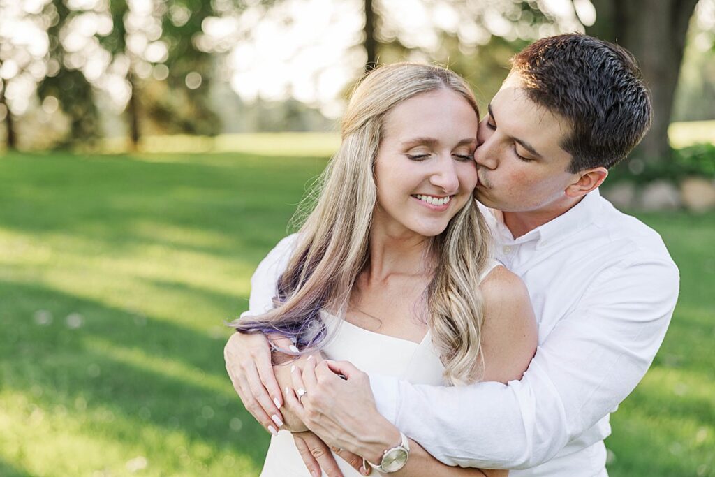 Elevated engagement portraits with timeless outfits during a Michigan session