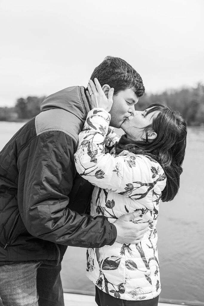 Couple celebrating their engagement along Boardman Lake