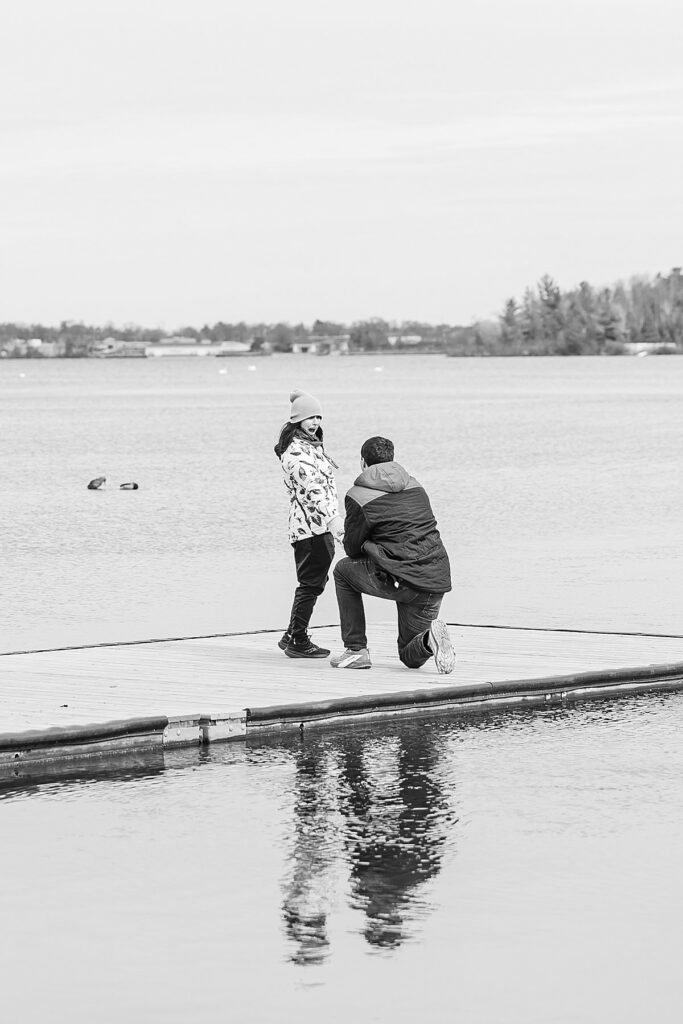Traverse City proposal photographed on a quiet bridge along Boardman Lake