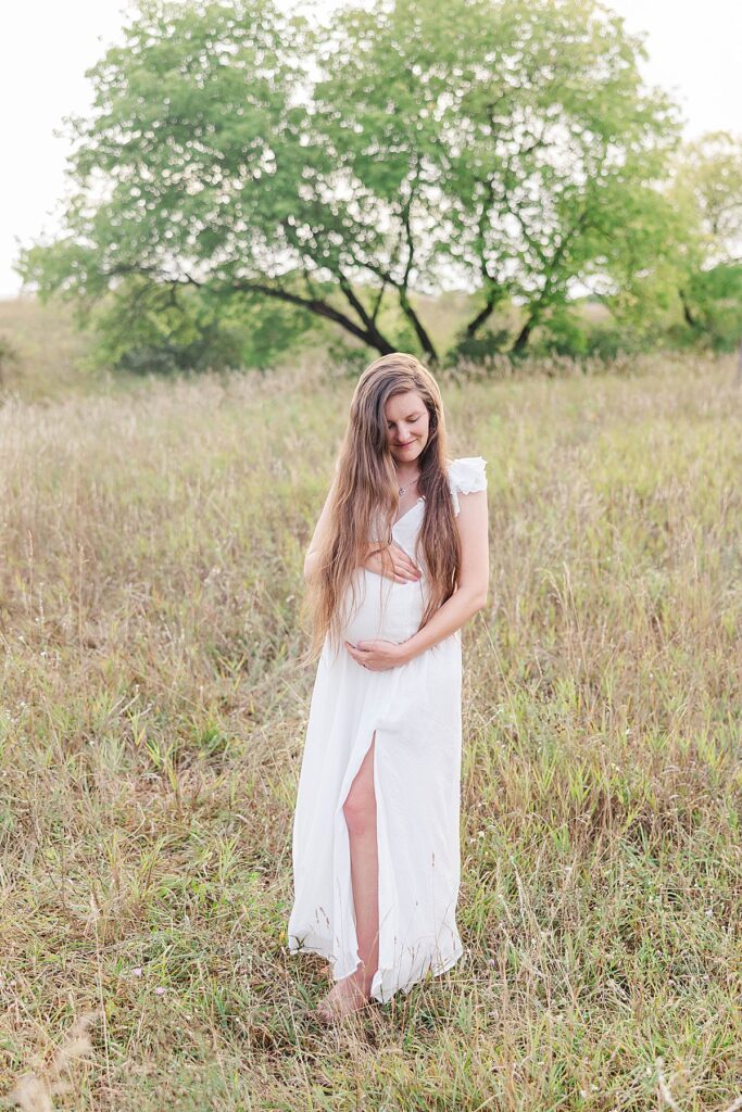 Soft outdoor maternity photos in Northern Michigan at sunset