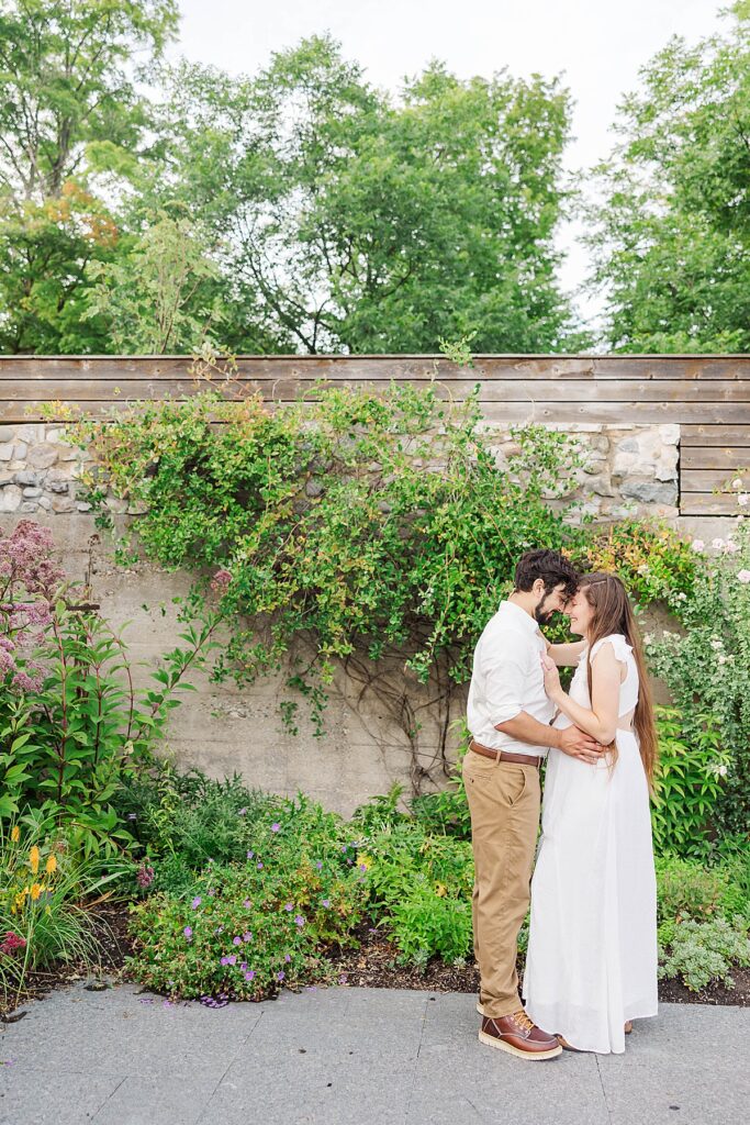 Traverse City maternity session at the Botanical Gardens with soft garden light