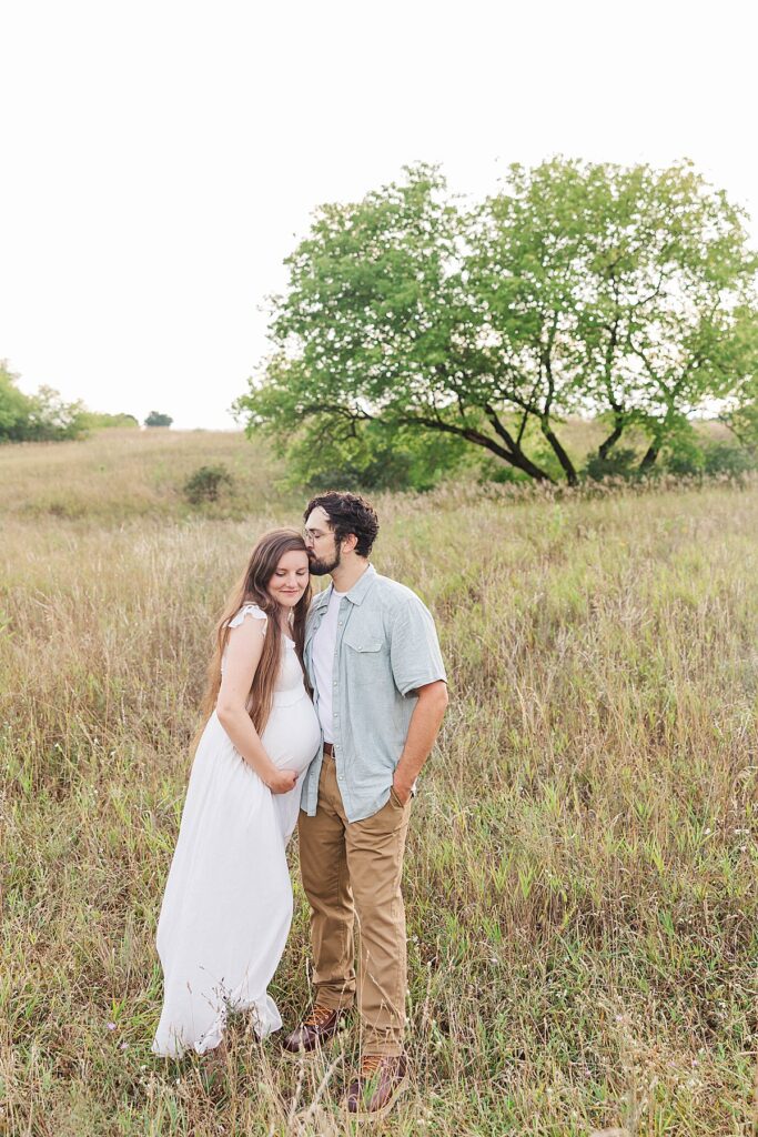 Maternity portraits in an open field at the Botanical Gardens in Traverse City
