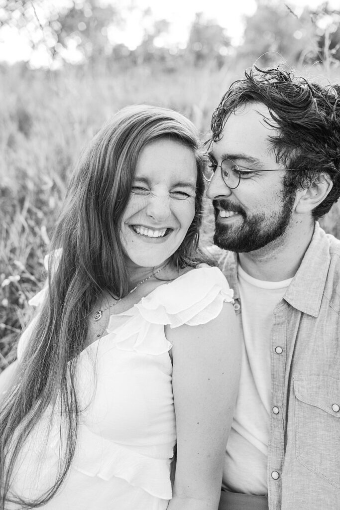 Close-up maternity photo of hands on baby bump at the Botanical Gardens