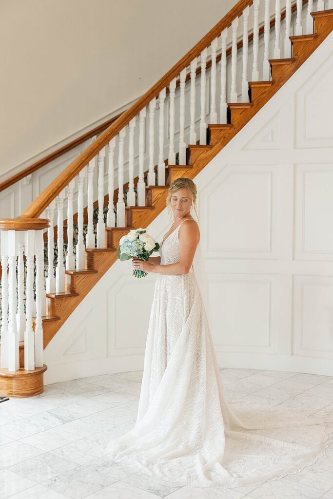 Bride portraits in front of the staircase at Black Star Farms