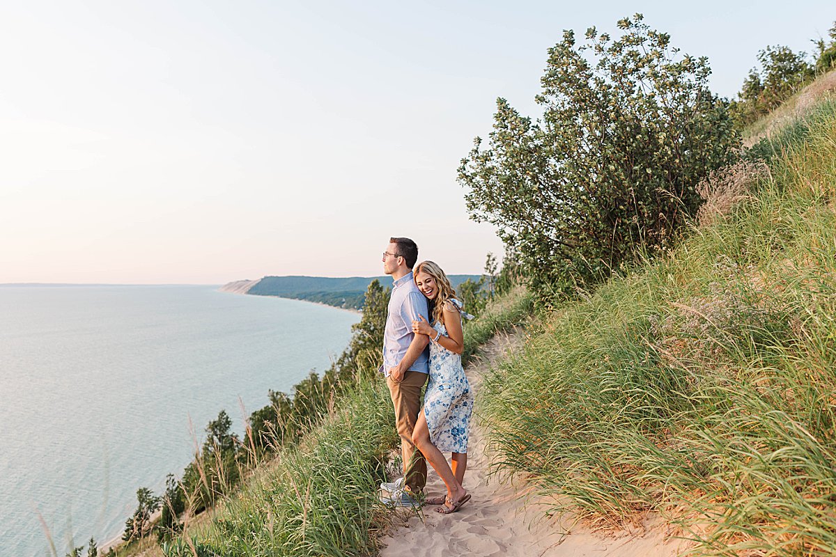 Engaged couple during a Northern Michigan engagement session with natural connection and movement