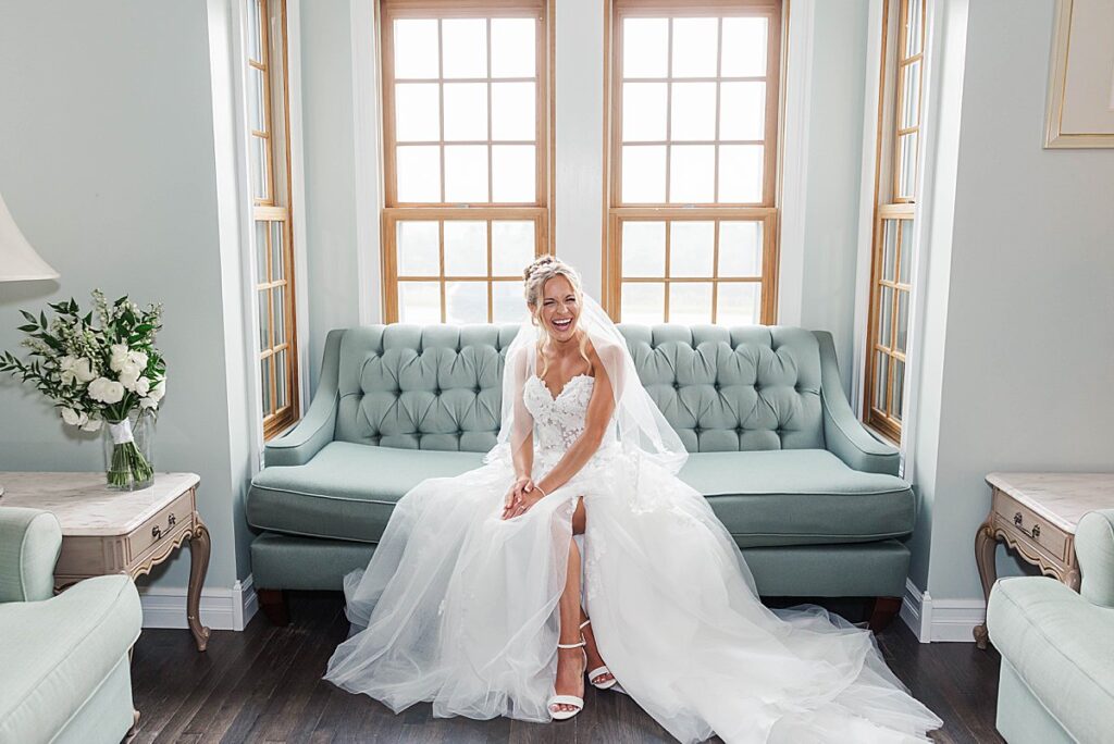 Bride getting ready for a Traverse City wedding in a light-filled Northern Michigan venue