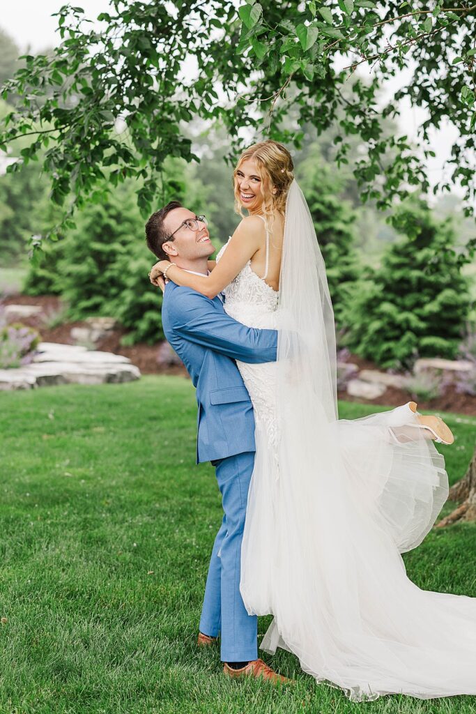 Romantic portrait at a Traverse City wedding with natural Northern Michigan greenery