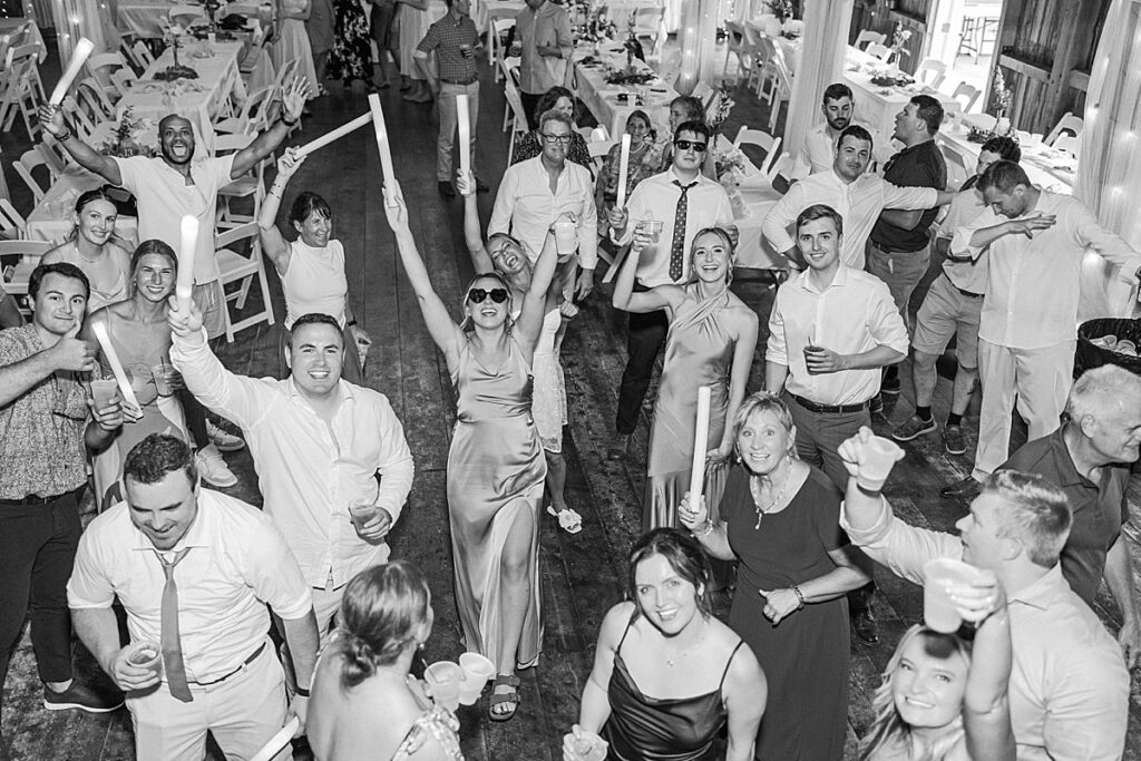 Joyful wedding reception moments at Blue Sky Barn