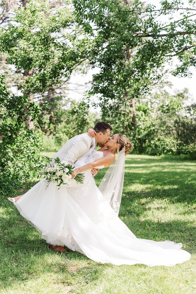 Bride and groom celebrating during their Blue Sky Barn wedding