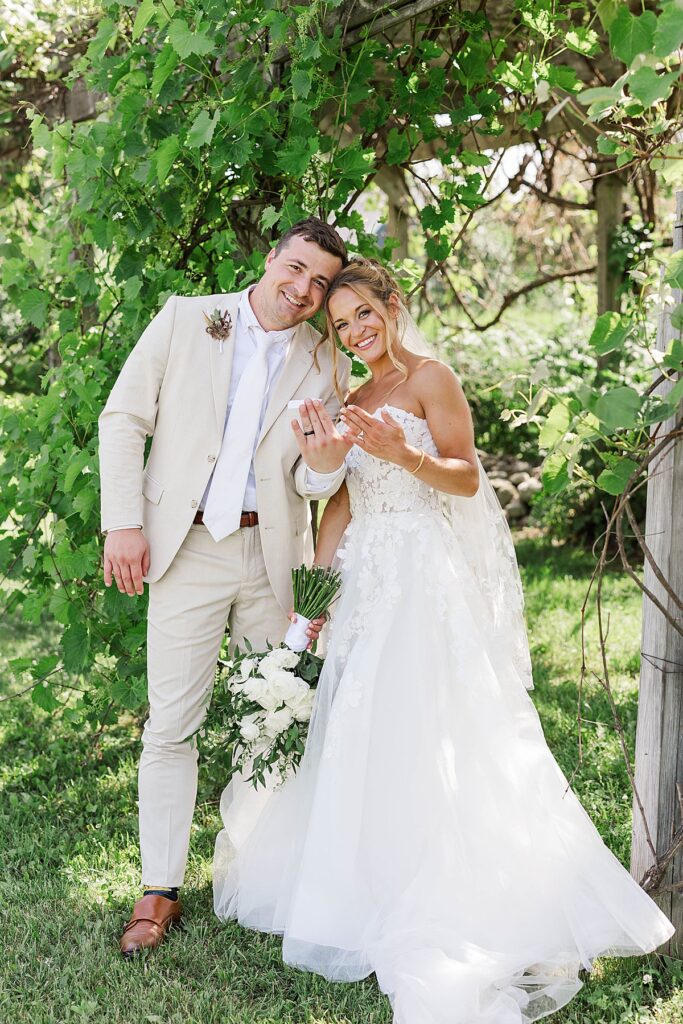 Bride and groom celebrating during their Blue Sky Barn wedding