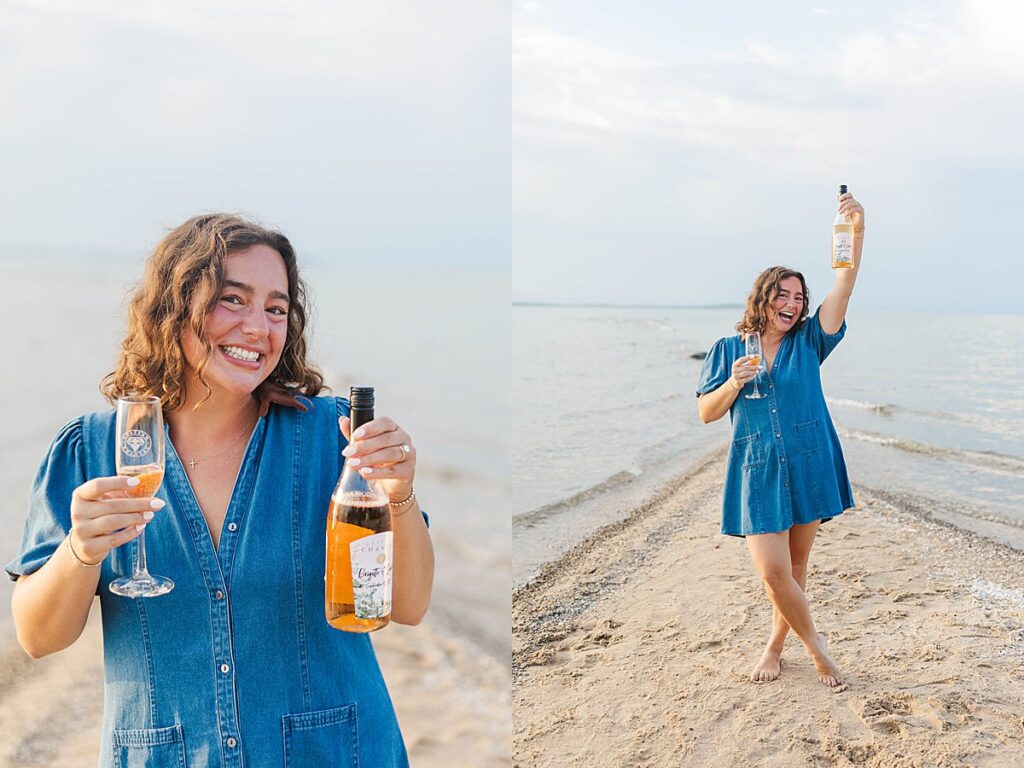 Newly engaged couple celebrating on the beach in Elk Rapids, Michigan