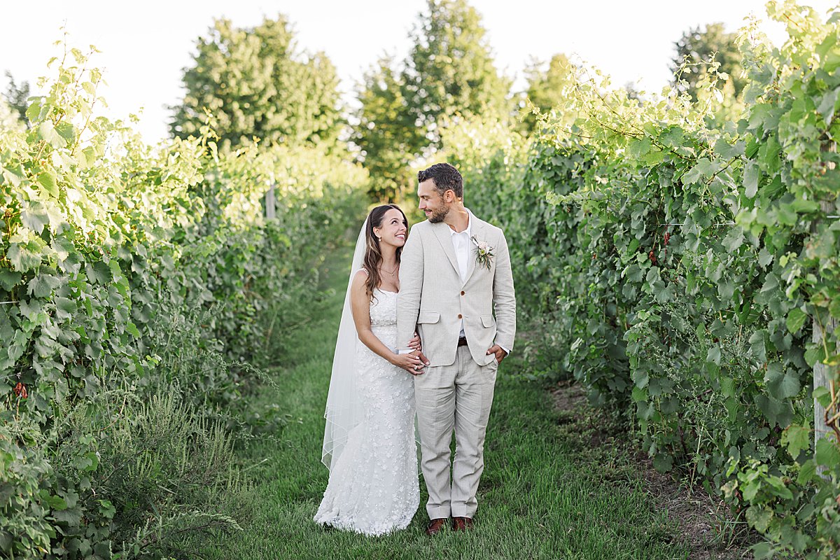 Romantic couple portrait in the vineyard at Bay View at Gallagher Farms in Northern Michigan